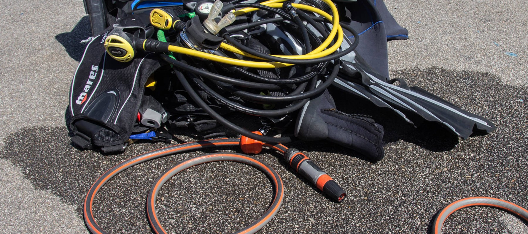 A Bin Full Of Dive Gear To Be Cleaned After A Dive In Brittany, France, Europe