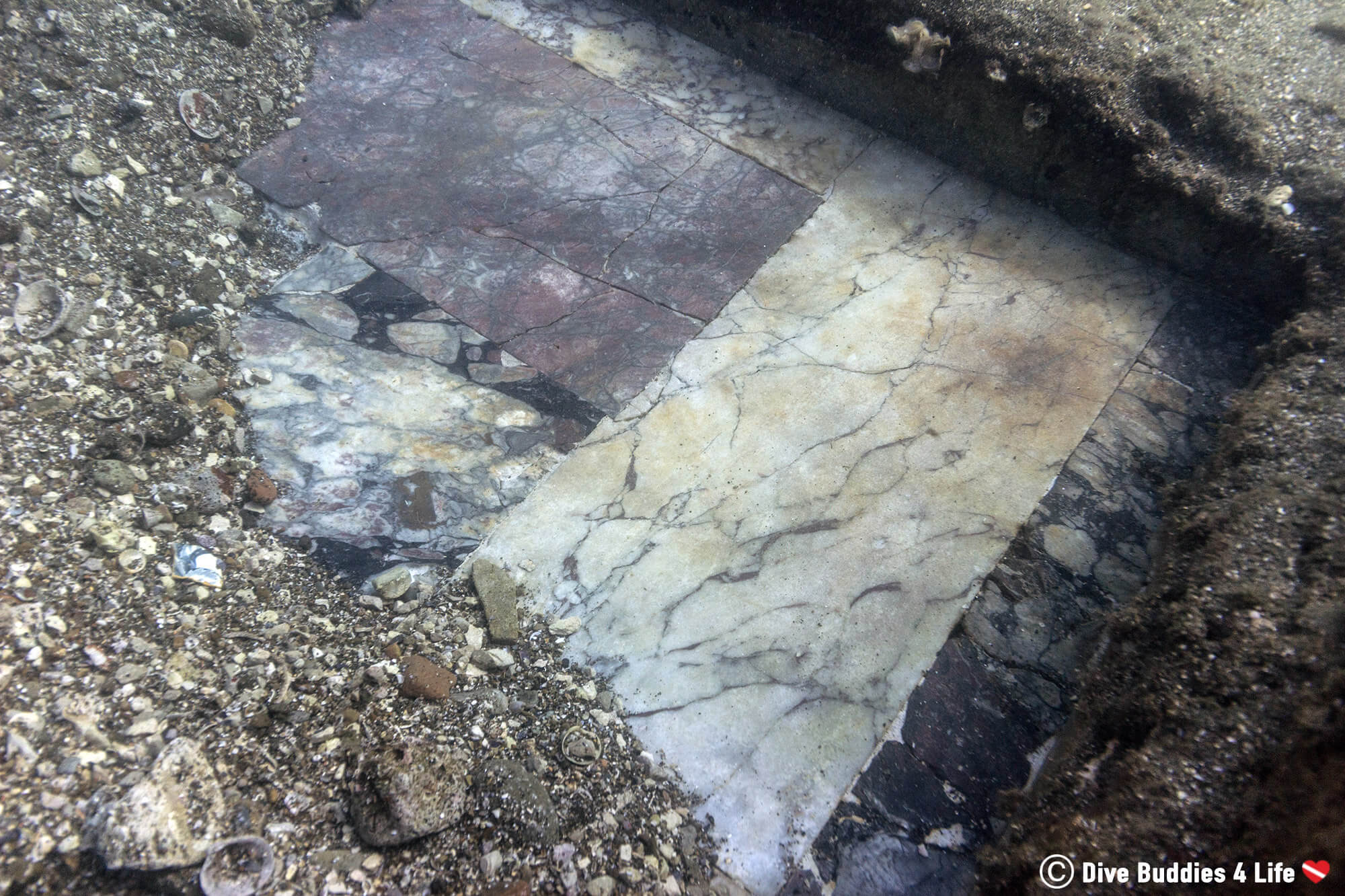 A Sneak Peek At The Marble Mosaic Tile Of The Once Vacation Villa Of Baiae, Now Submerged Under The Sea In The Gulf Of Naples, In Italy, Europe