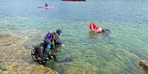 A Trio Of Scuba Divers Heading Into The Water Of Lake Huron For An Underwater Adventure, Scuba Diving Canada