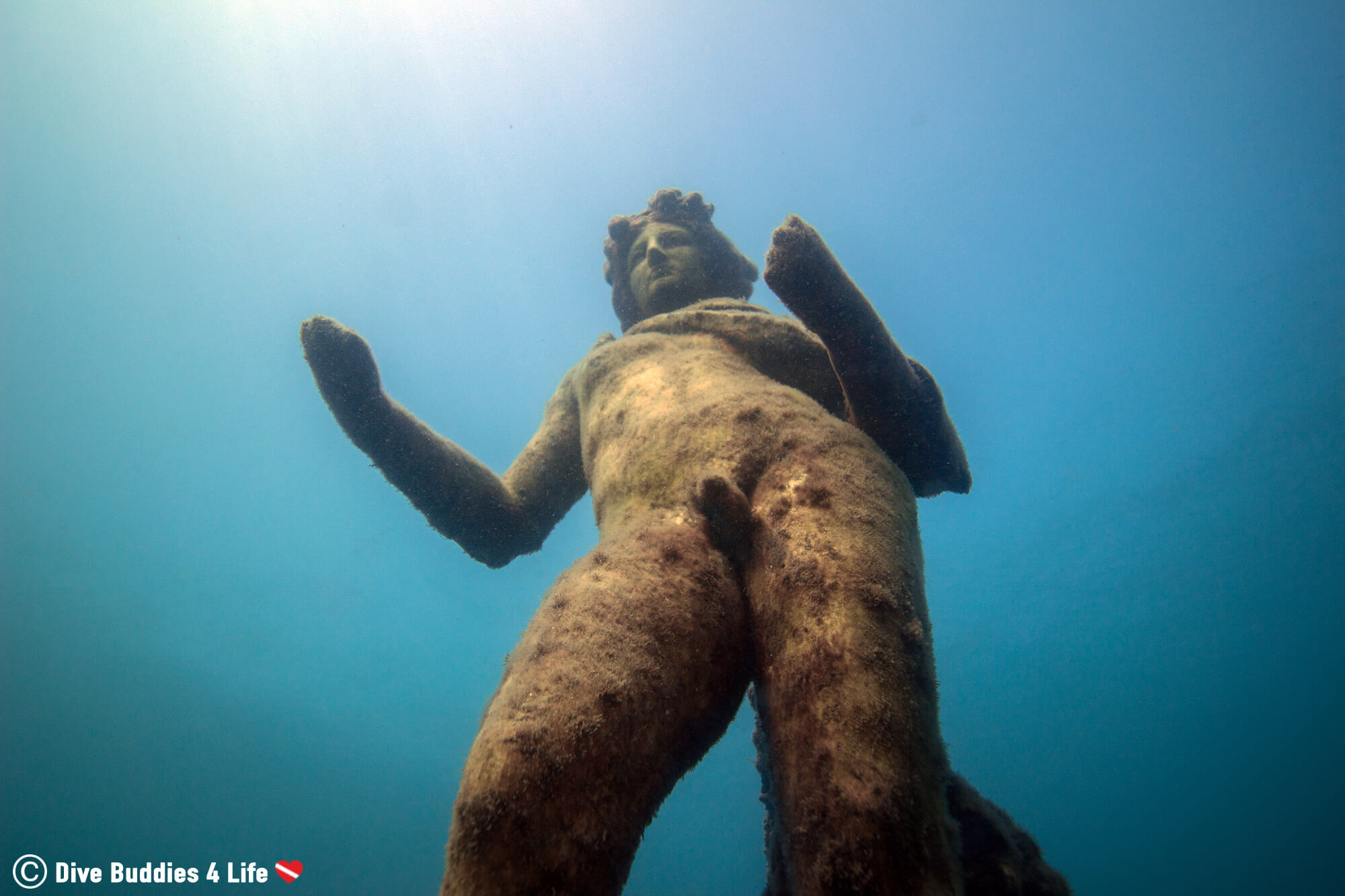 A View Of A Nude Roman Statue Submerged In The Waters In The Gulf Of Naples At Baiae, Italy, Europe