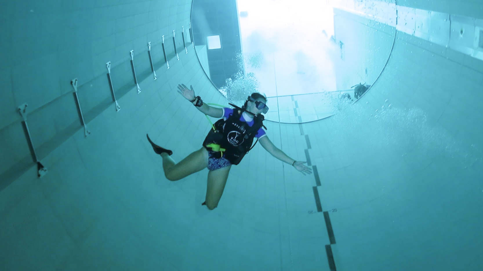 Ali Free Falling To The Bottom Of The Y 40 Indoor Pool