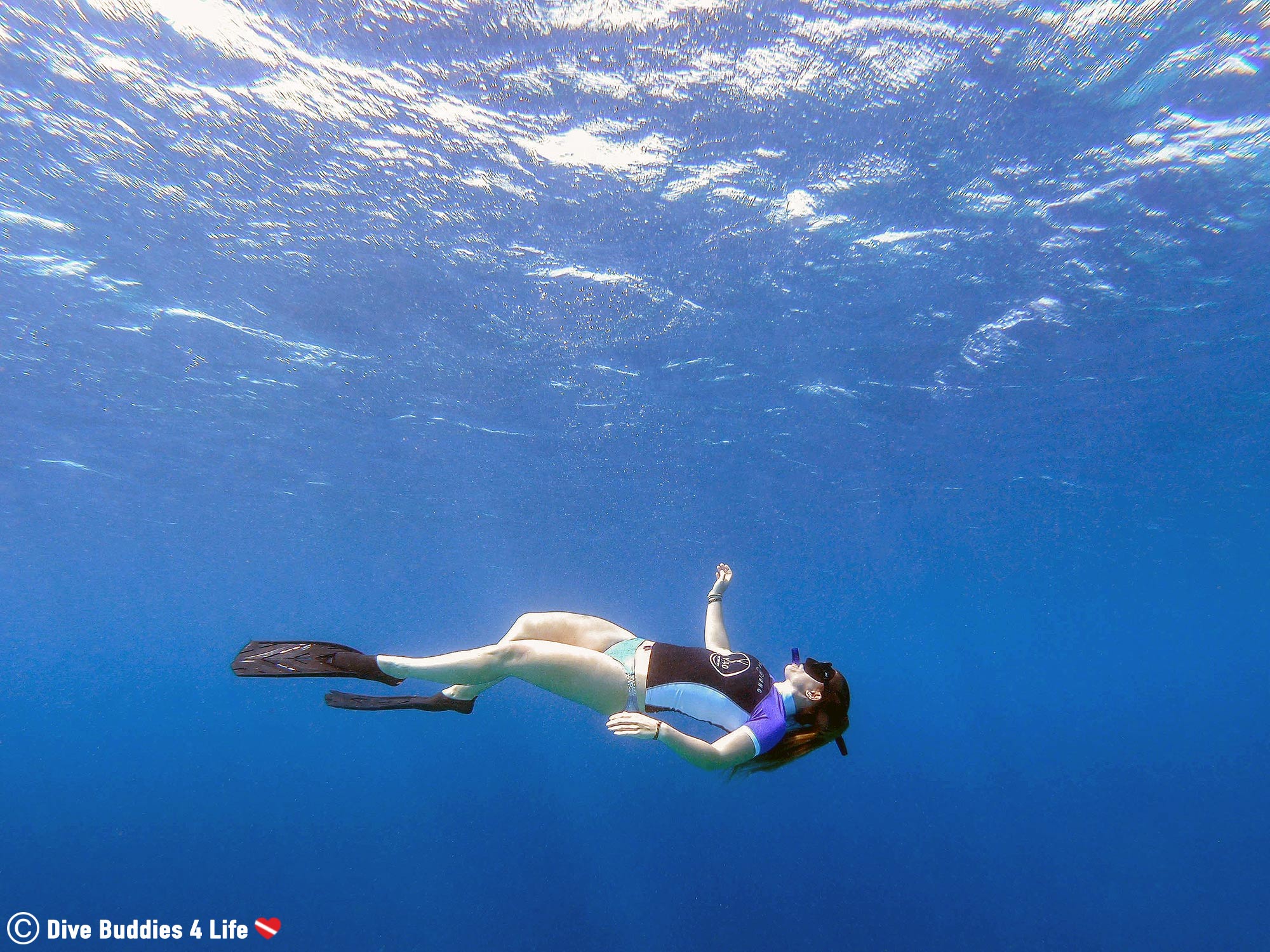 Ali Looking Up At The Waves Along The Surface Of The Sea, Bonaire Snorkeling