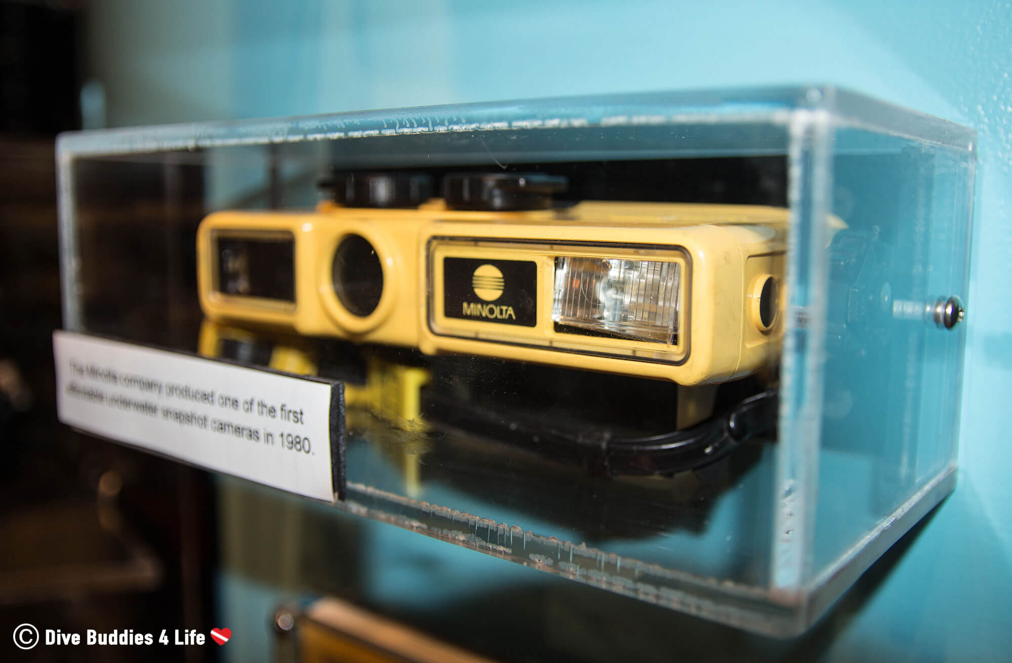 An Ancient Point And Shoot Underwater Camera In A Scuba Diving Museum