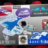 Dive Buddies Sticker on a Laptop