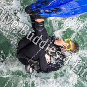 Female Scuba Diver Back Rolling Into The Water Scuba Shop 2