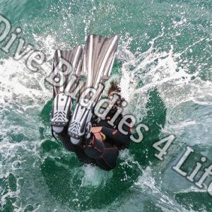 Female Scuba Diver Back Rolling Into The Water Scuba Shop 4
