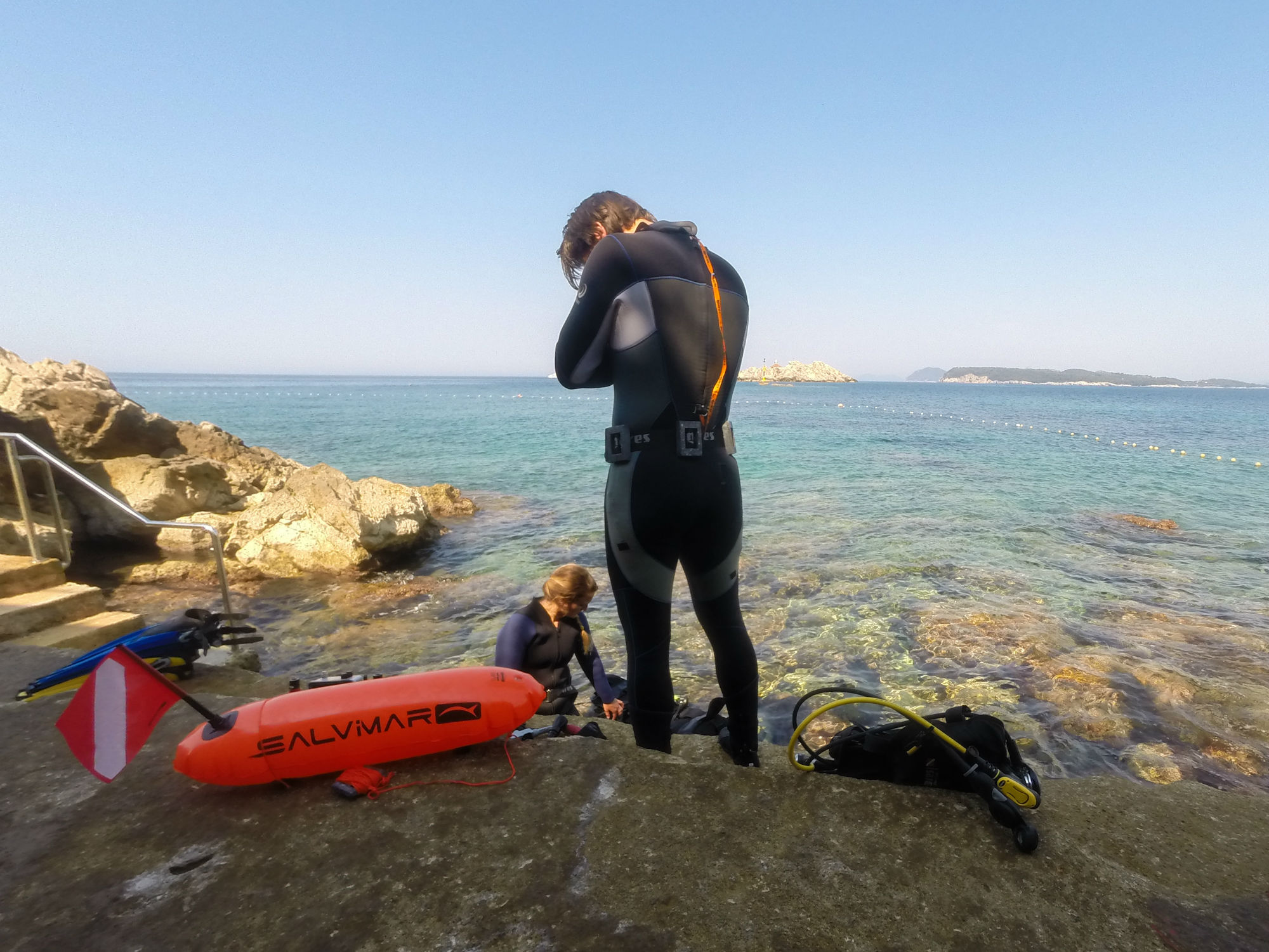 Joey and Ali Preparing to Scuba Dive in Croatia with a Surface Marker