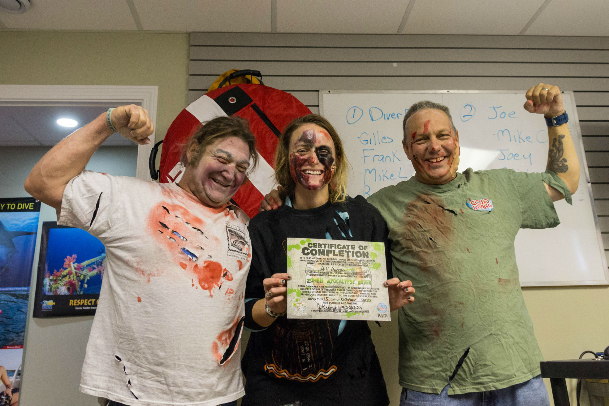 Ali with Her Certificate of Completion for the Zombie Apocalypse Diver Course