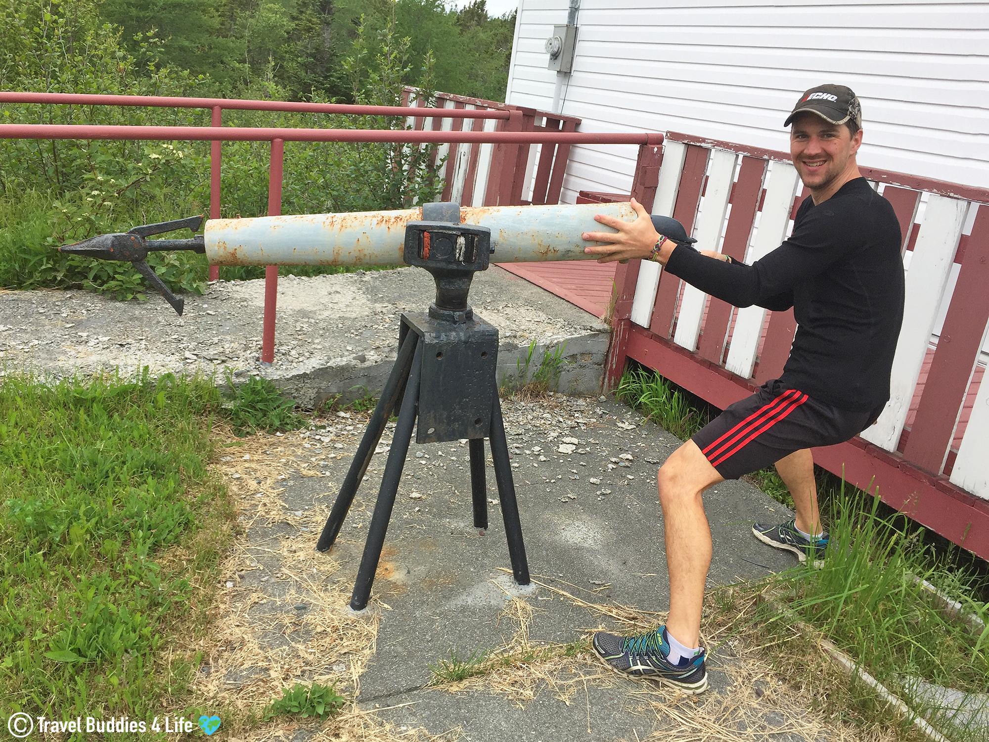 Joey Playing With A Whaling Gun In Dildo, Trinity Bay, Newfoundland, Canada