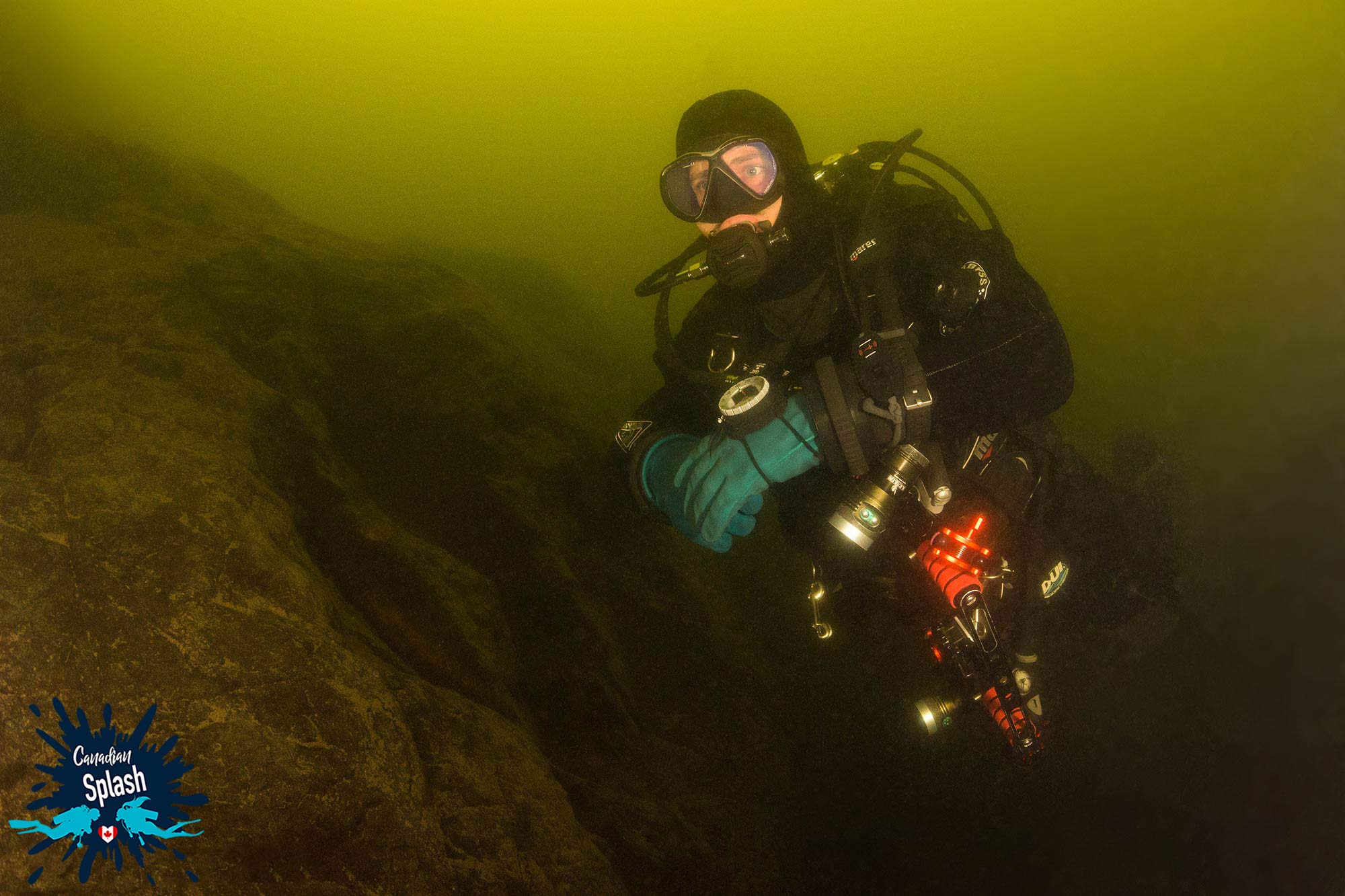 Joey Scuba Diving Along The Bottom Of West Hawk Lake A Meteor Impact Crater In Manitoba, Canada