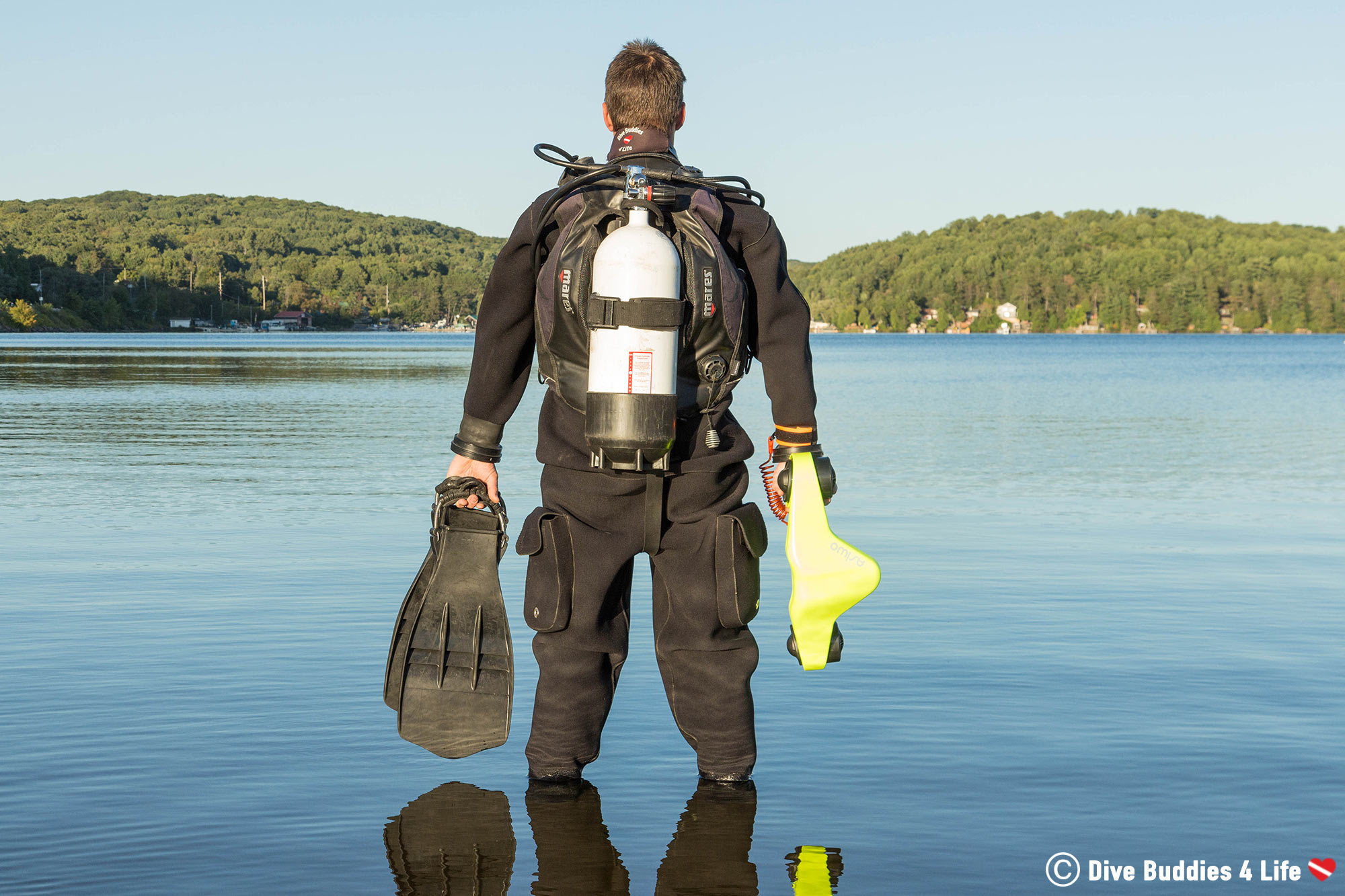 Joey Standing At The Water's Edge With His Dive Gear And The Manta Sea Scooter In Northern Ontario, Canada Diving