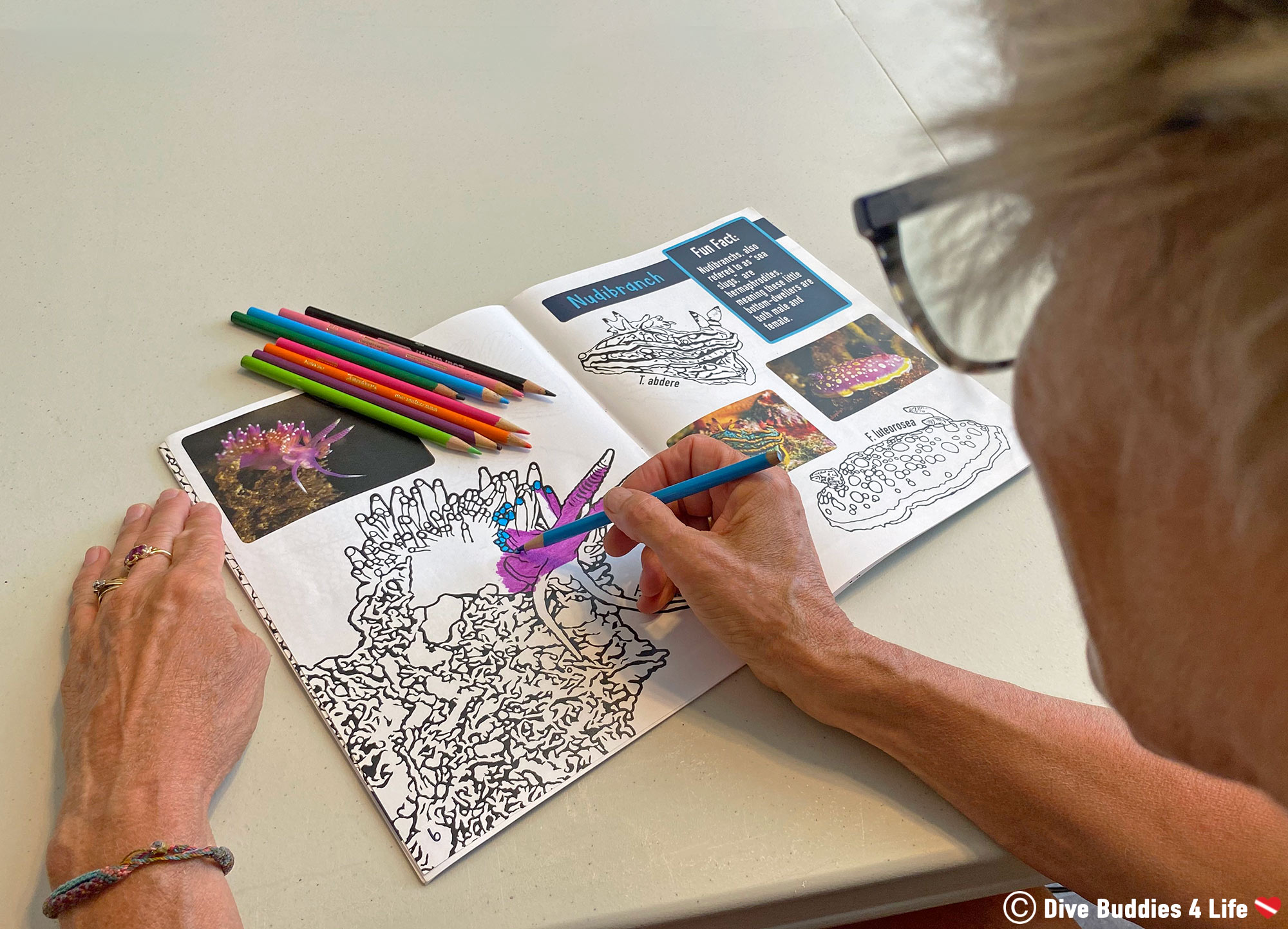 Mom Colouring In Our Underwater Colouring Book