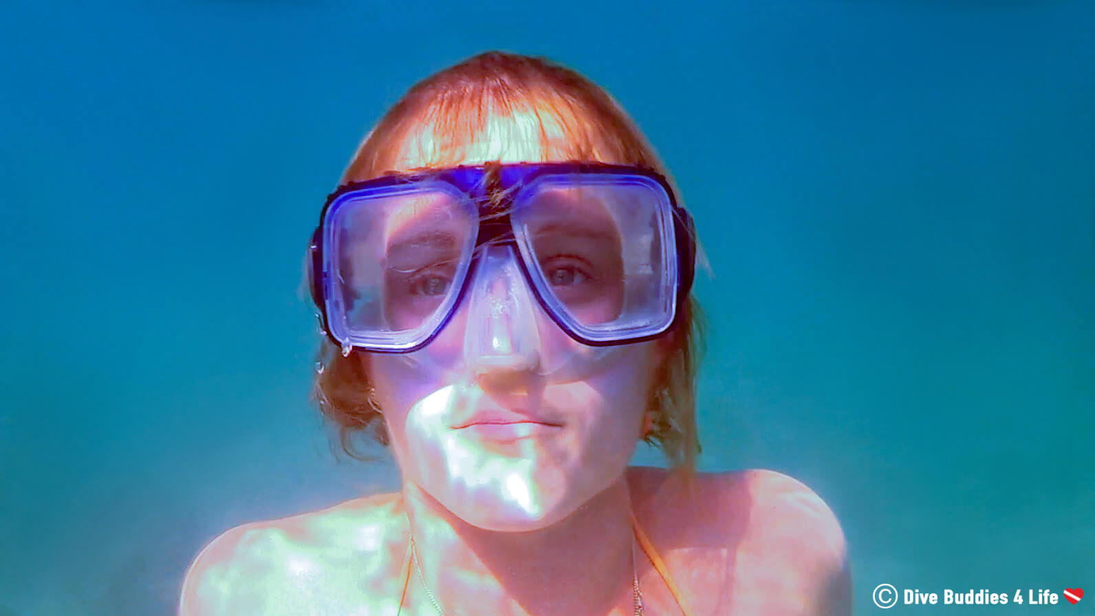 Snorkelling Ali's Face Underwater With Her Scuba Diving Mask In Playa Del Coco, Costa Rica, Central America