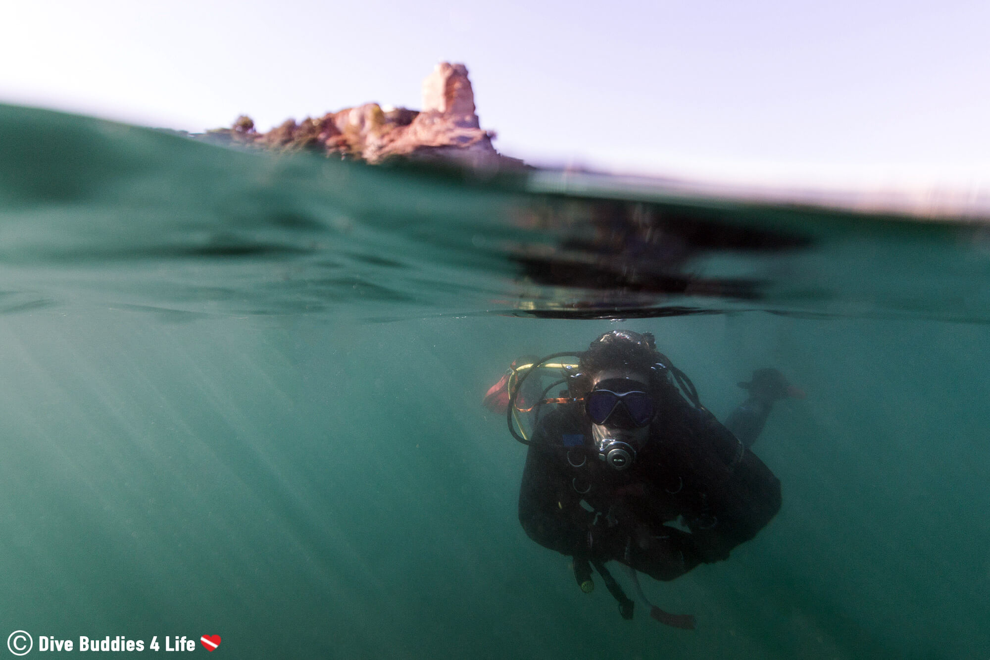 Split Photograph Of Joey Scuba Diving With Roman Ruins On Land Behind Him In Baiae, Naples, Italy, Europe