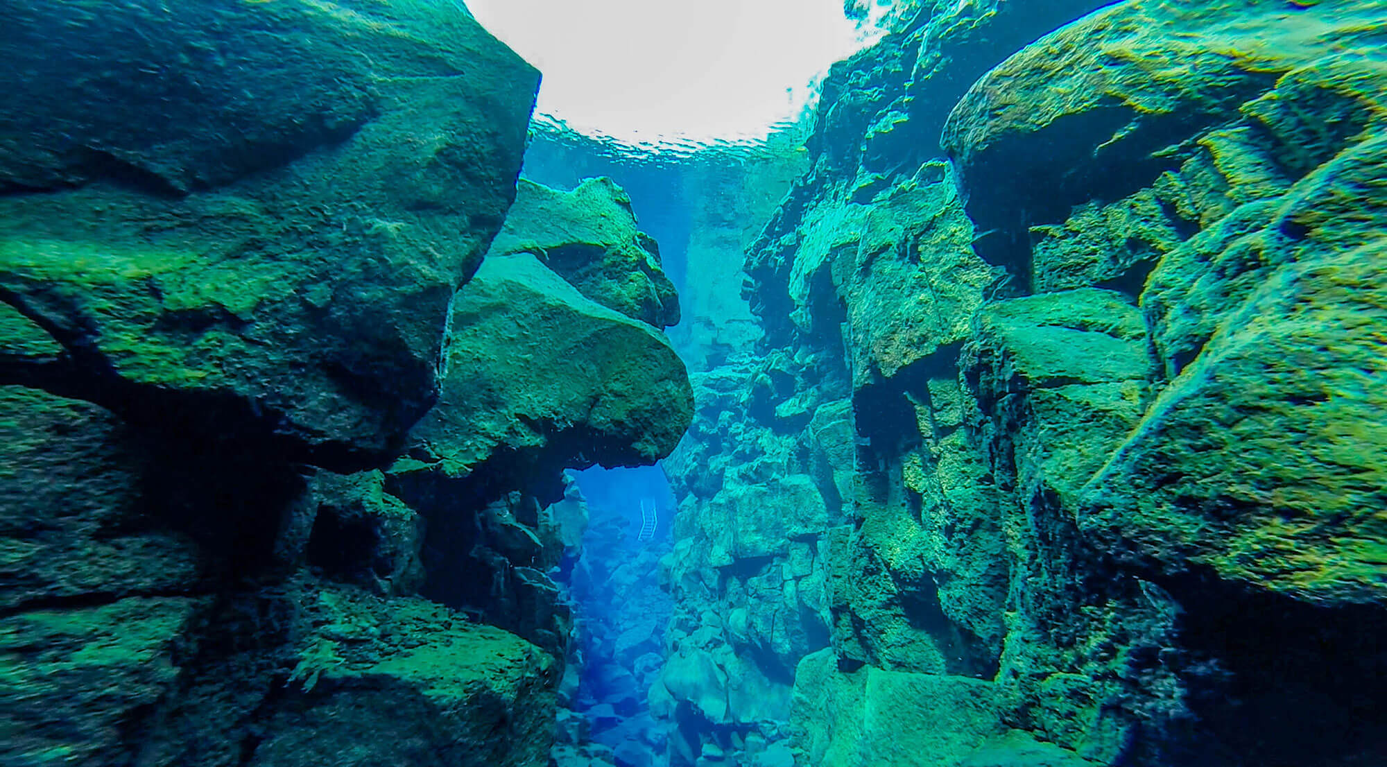 The Clear Water Of The Silfra Fissure With The Scuba And Snorkel Entry Ladder In The Distance, Iceland, Europe