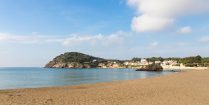 The Golden Beach And Blue Water Of Spain's Famous Costa Brava In Europe