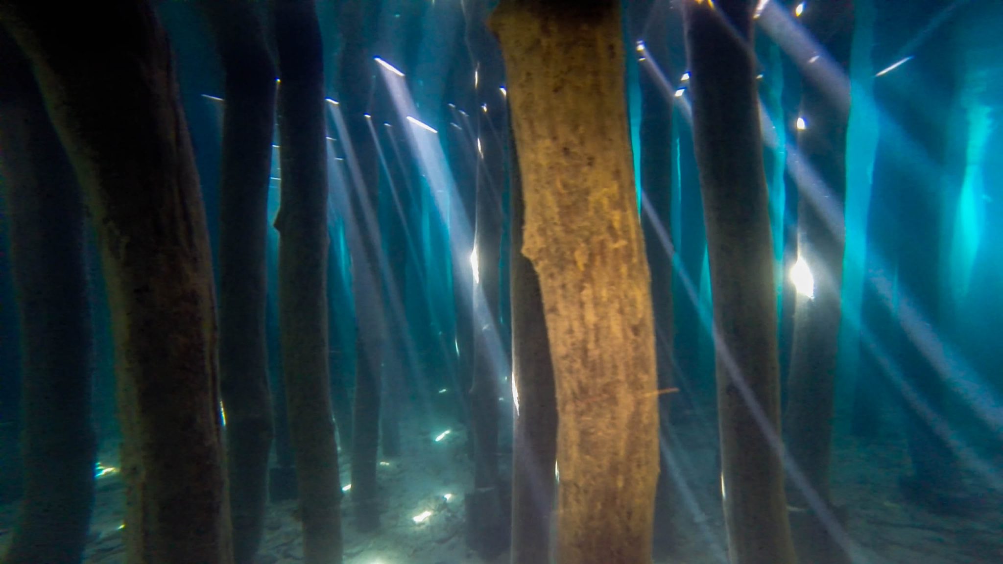 The Light Piercing Through Underwater at The Columns Of The Bay Of Bones in Macedonia