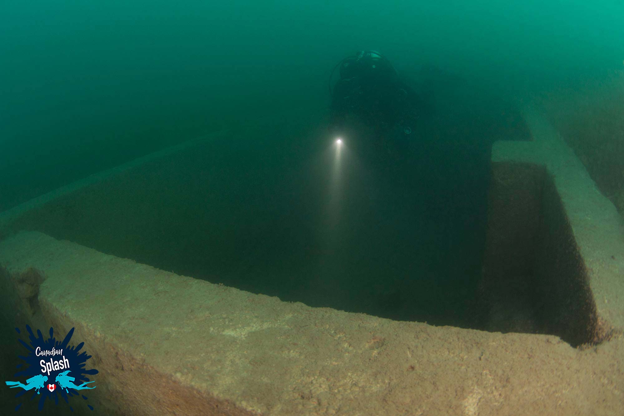 The Remaining Foundation Of A Building Sunken On The Bottom Of Lake Minnewanka In Banff National Park, Alberta, Canada Scuba Diving