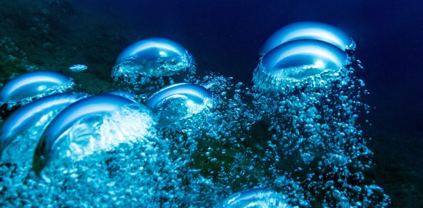 Underwater Bubbles From A Regulator Heading Towards The Surface In Italy